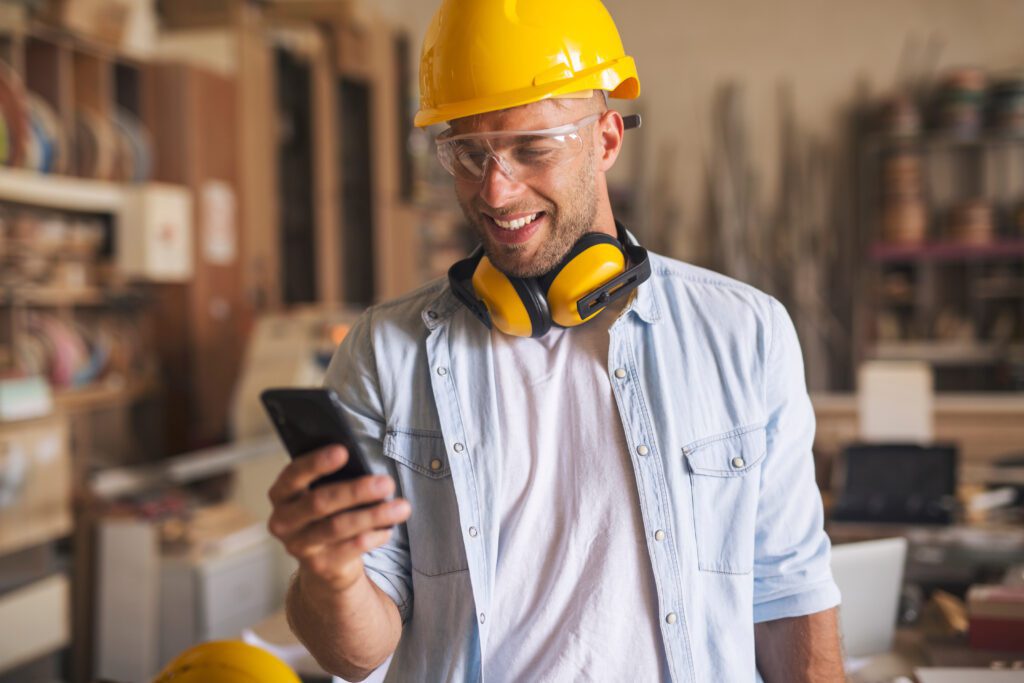 Side,View,Of,An,Attractive,Young,Joiner,At,His,Workplace,